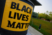Black Lives Matter Yellow and Black Banner hung on Learning Commons Overlook We Stand with You