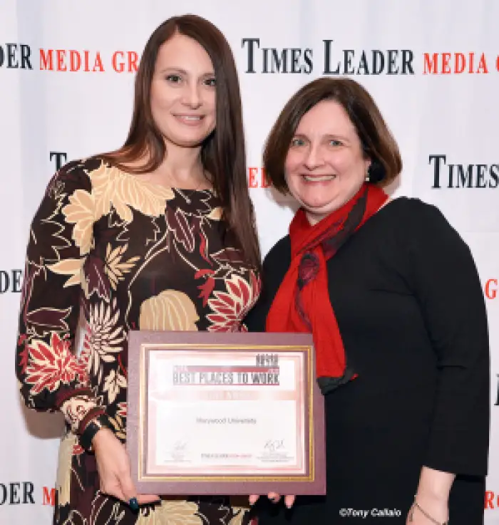 Christina Brundage and Molly Baron with their award 