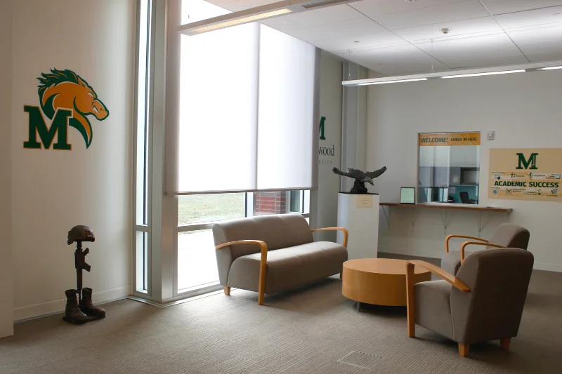 A waiting room area with matching furniture.